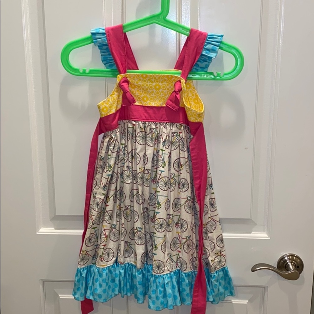 Girls handmade bicycle dress with tie waist